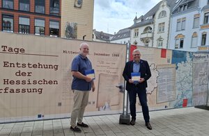 Bild mit ausf&uuml;hrlicher Beschreibung vergr&ouml;&szlig;ern: Bauzaun-Ausstellung
